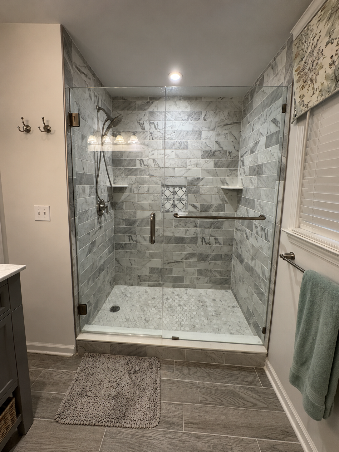 Frameless glass shower enclosure installation by Graceview Glass